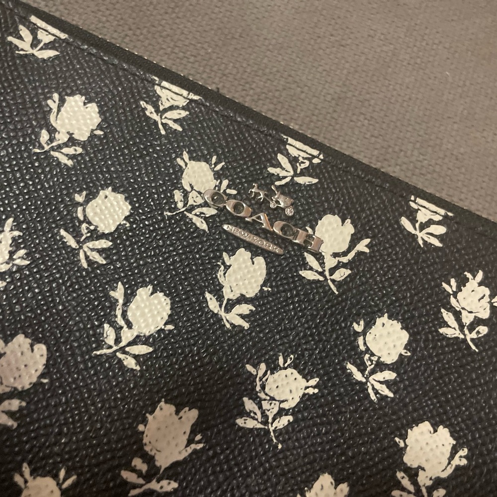 Coach black and white floral accordion wallet